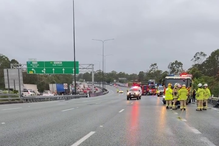A highway blocked off with emergency responders