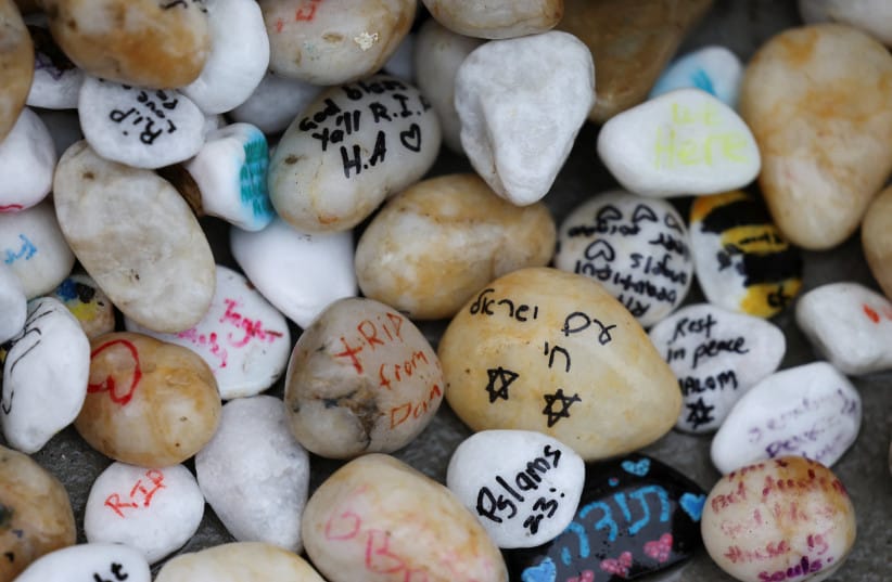 Messages are written on stones laid to honour the families and victims of a deadly mass shooting during a Jewish Hanukkah celebration at Bondi Beach on December 14, 2025, in Sydney, Australia, February 9, 2026.