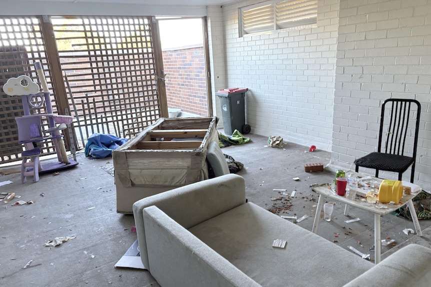 broken seats, tables inside a storrage space in a social housing complex in redfern