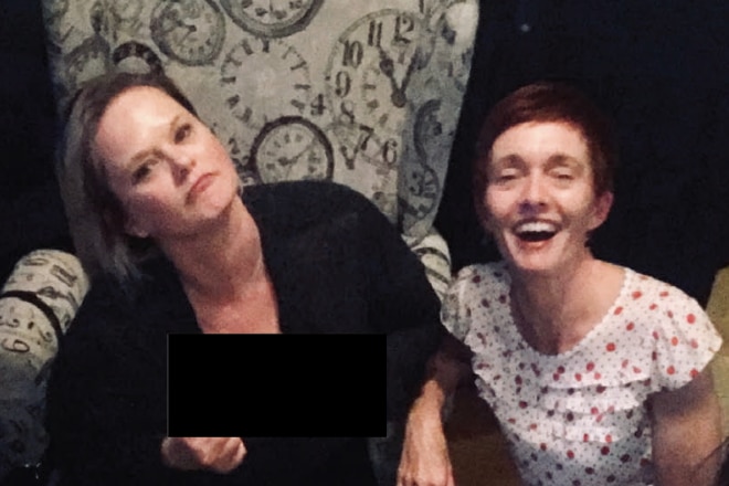 Roxanne and Gail joking around on a couch.