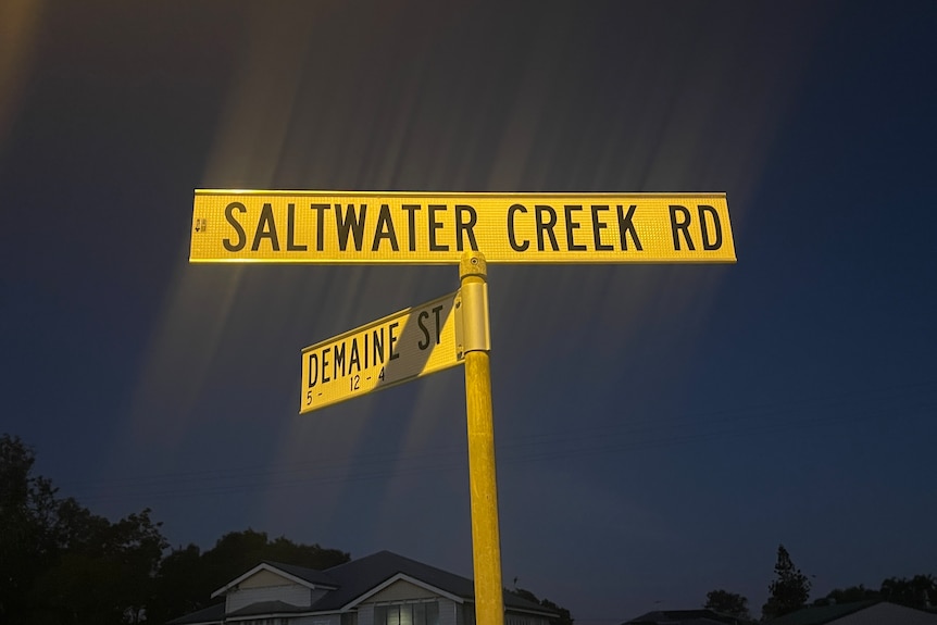 Street sign reading "Saltwater Creek Road".
