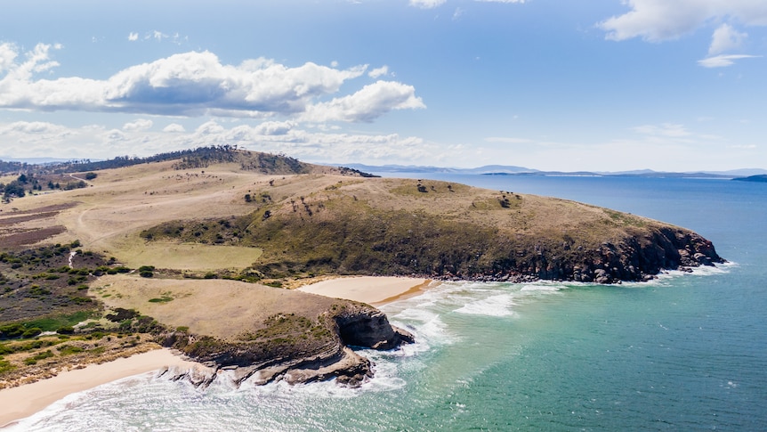 Aerial view of terrain on a coastline.