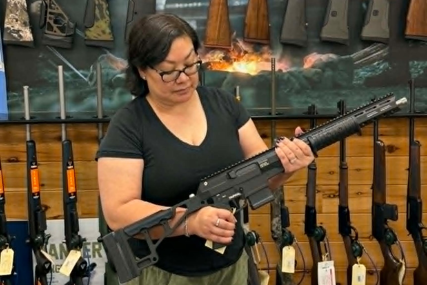 Woman holding rifle