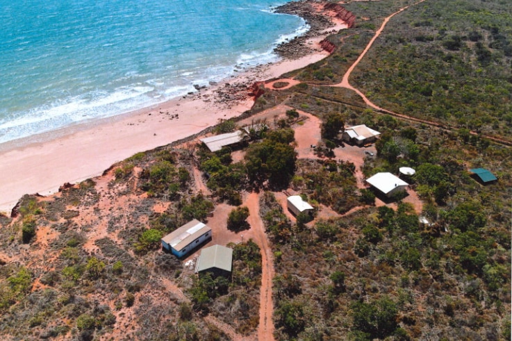 An aerial view of a bungalow of coastal buildings