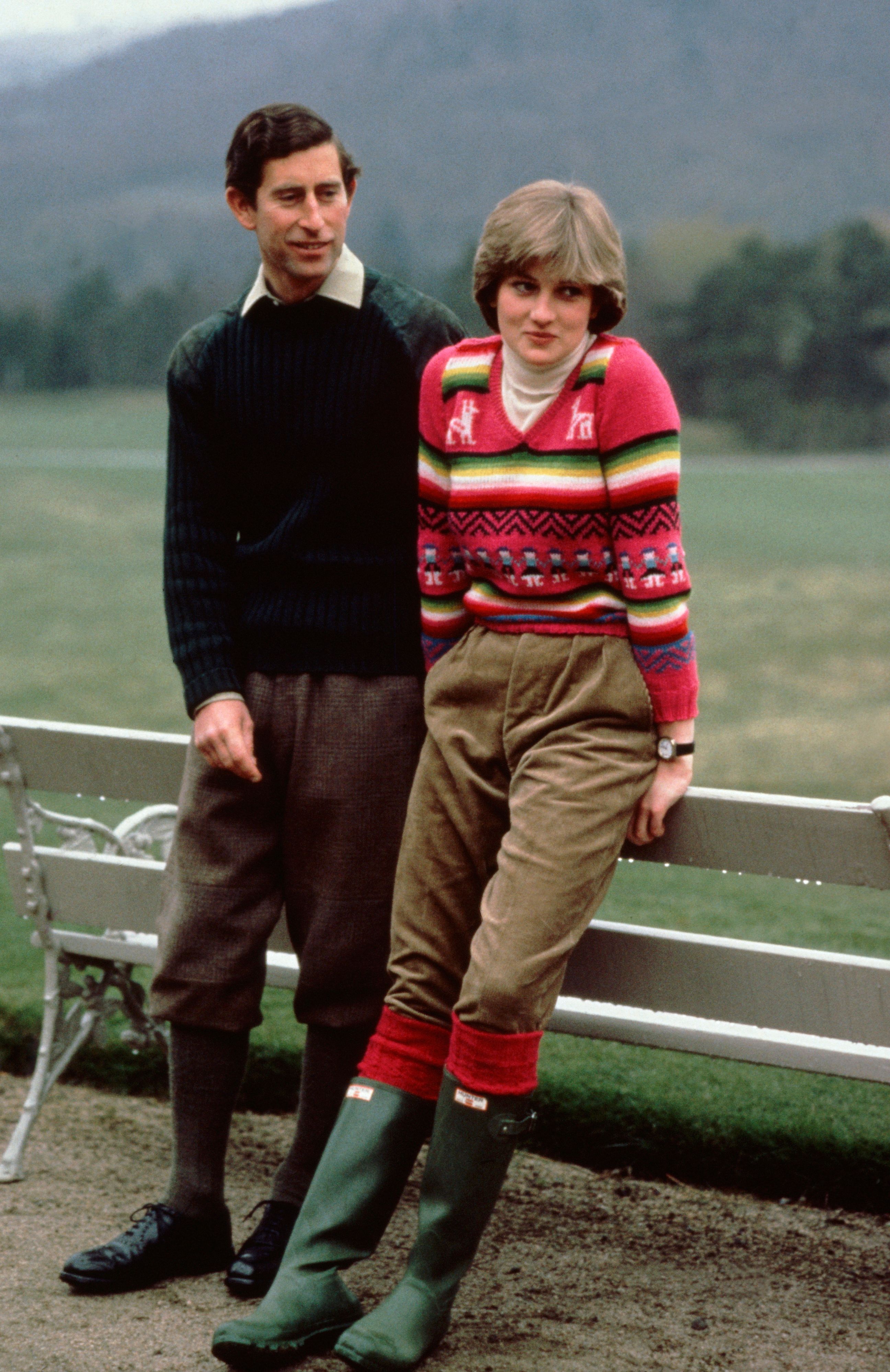 Image may contain Charles Prince of Wales Diana Princess of Wales Bench Furniture Clothing Knitwear and Sweater