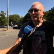 Personne interviewée sur la chaleur en Belgique.