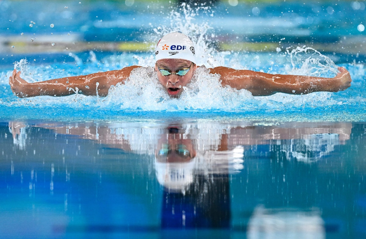 France's Leon Marchand competes in the final of the men's 200m butterfly swimming event during the LEN European Aquatics Championships at the Olympic Aquatic Centre in Saint-Denis, northern suburbs of Paris, on August 15, 2026. (Photo by JULIEN DE ROSA / AFP)