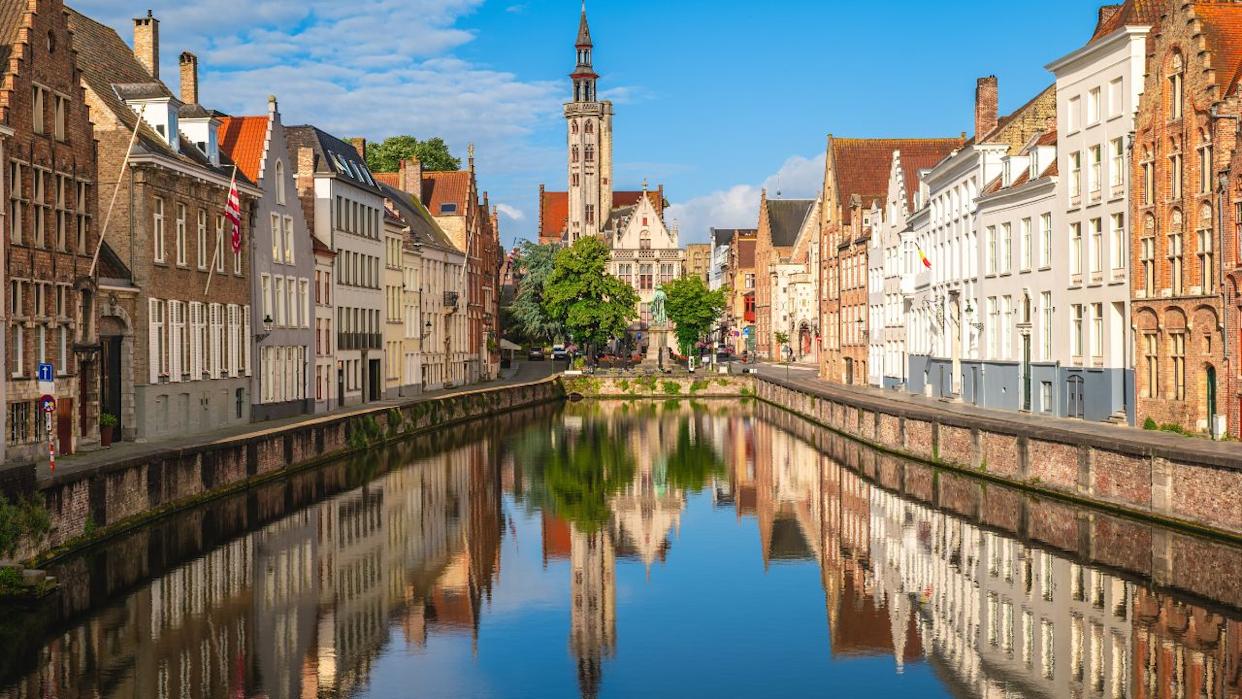 Scenery of Spiegelrei, a watercourse and street in the center of Bruges, Belgium.