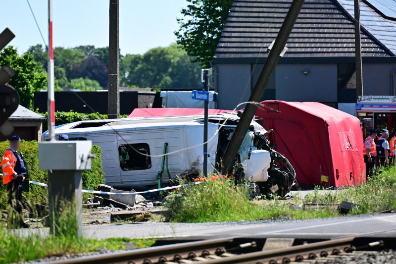 Several people killed as train collides with school bus in Belgium