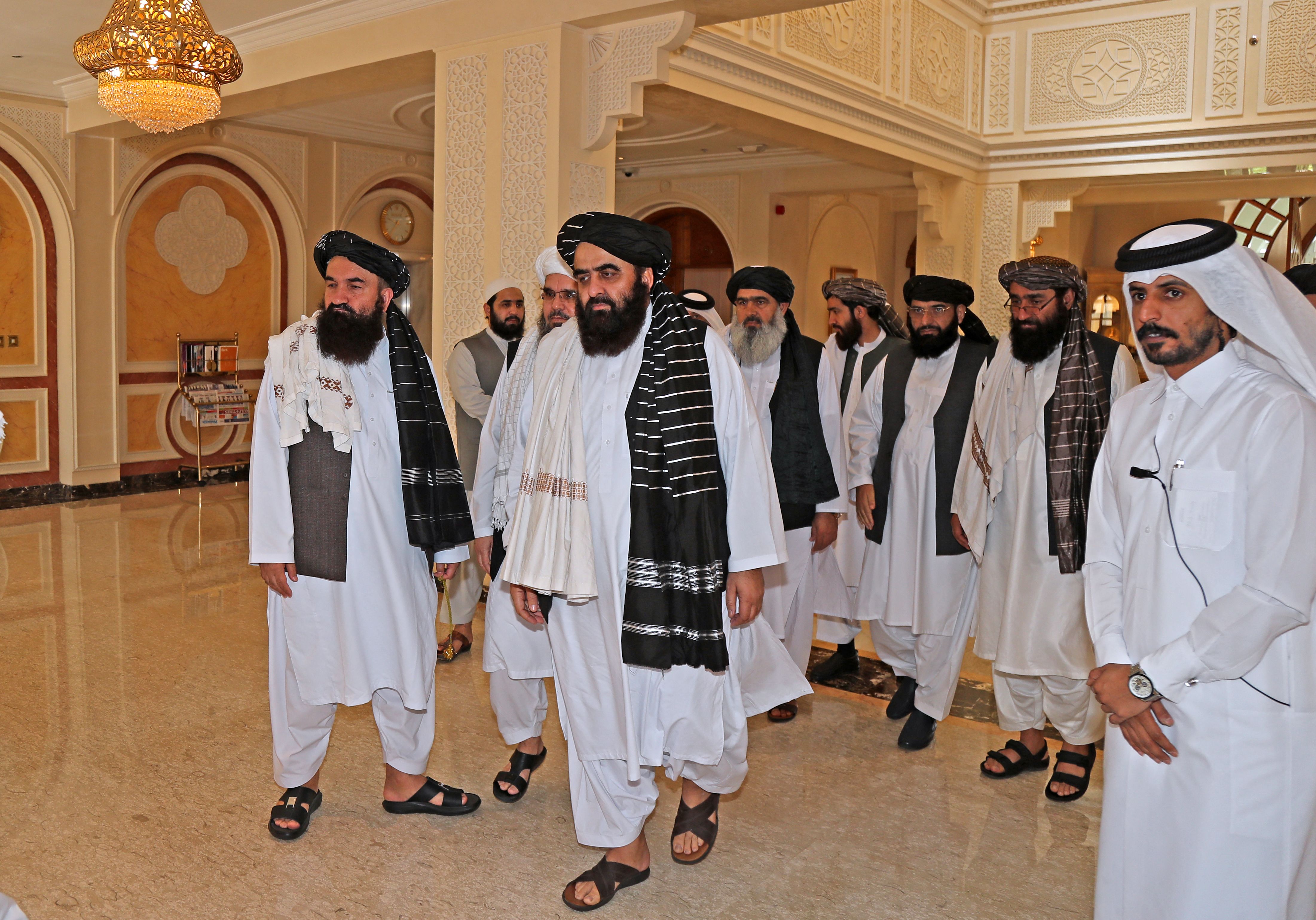 File: Members of the Taliban delegation arrive for a meeting with foreign diplomats in Qatar's capital Doha
