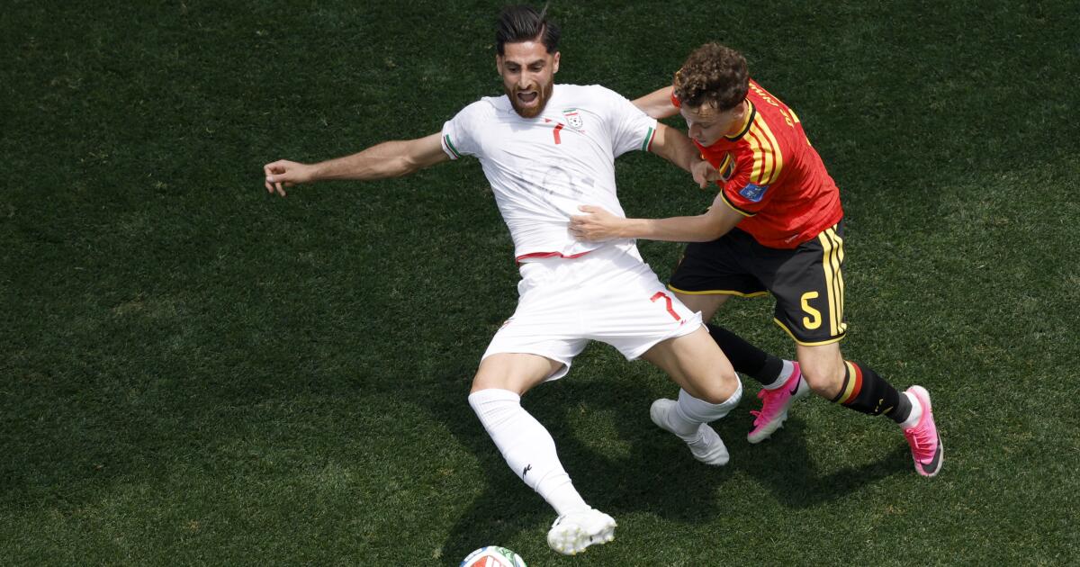 Iran's beleaguered World Cup team finds hope in draw vs. Belgium