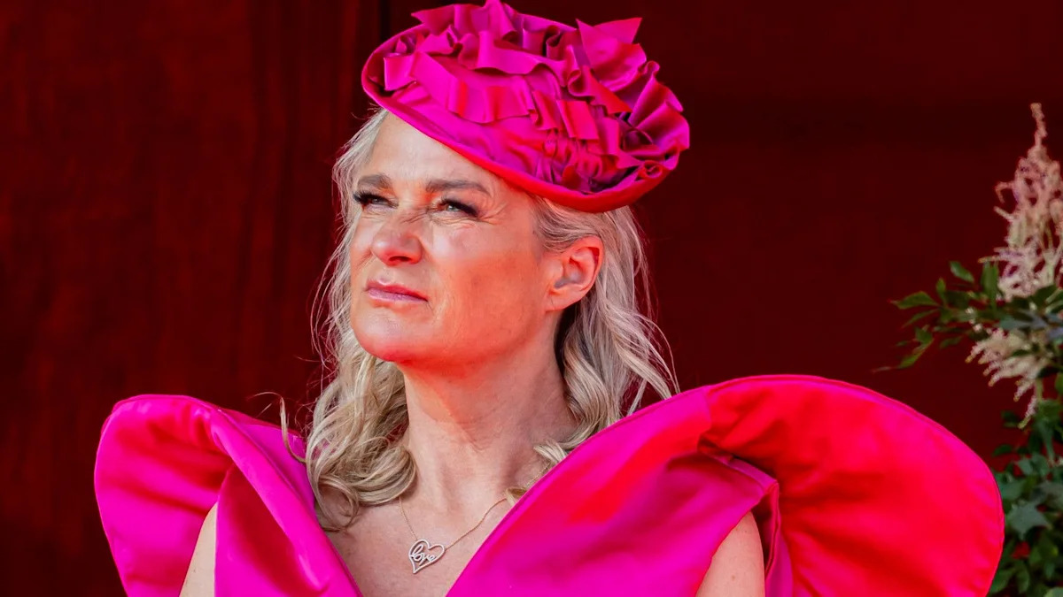 Belgian Princess hits back at 'inappropriate' dress claims as she denies 'stealing the spotlight' from royals with striking outfit