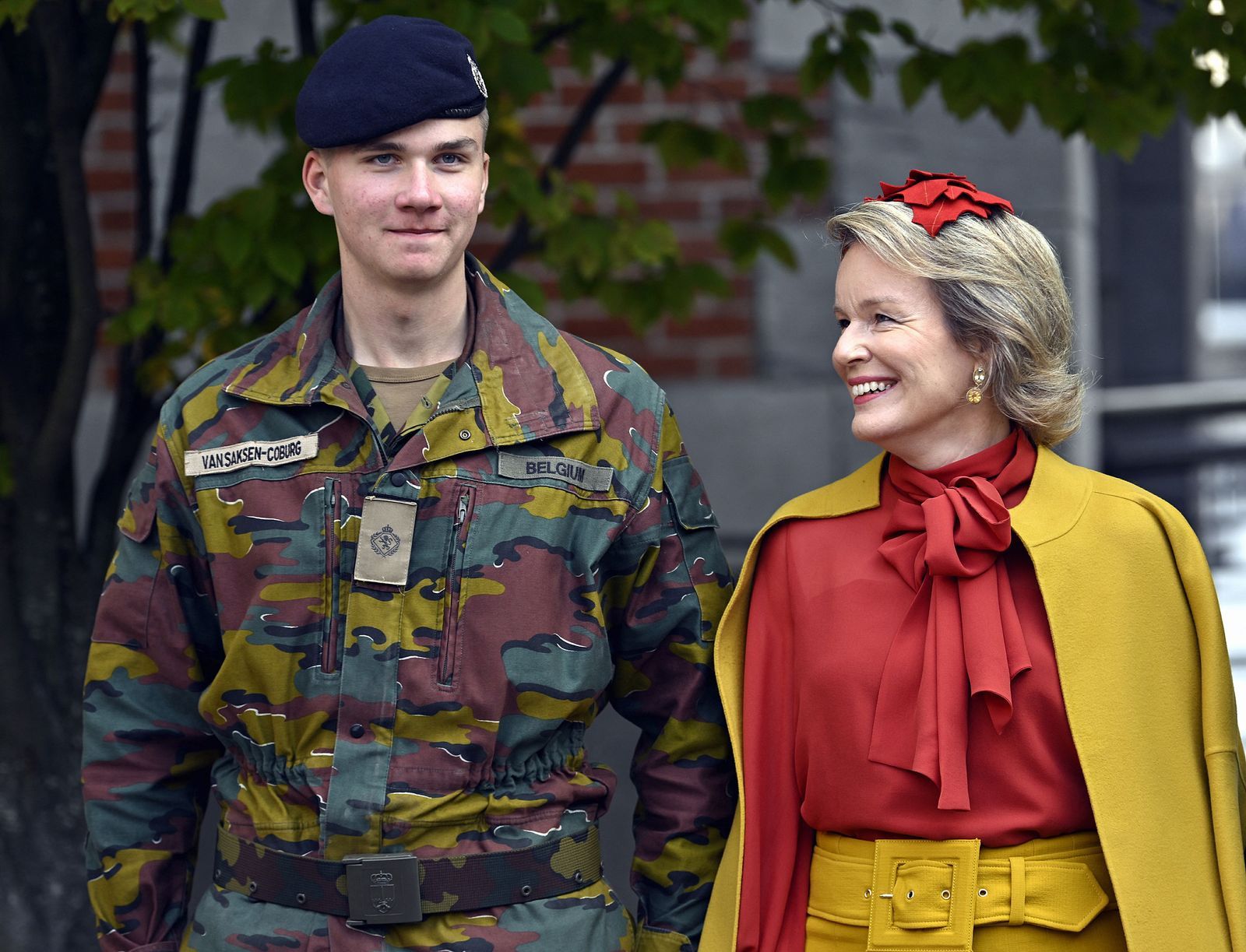 Queen Mathilde of Belgium looks at Prince Gabriel as they attend the Blue Berets parade held by firstyear students of...