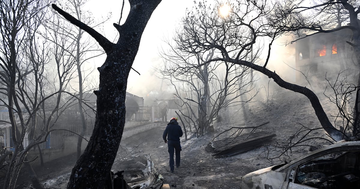 Wildfire still burning in Belgium and Greek authorities investigate deadly blaze