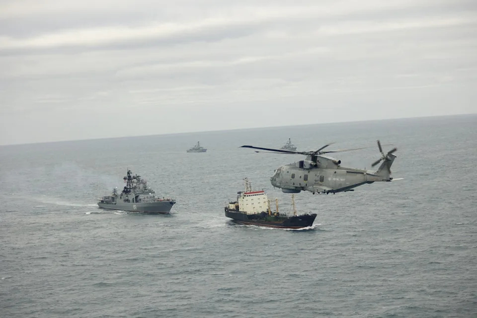 HMS Somerset and HMS St Albans with a Merlin helicopter tracking a Russian vessel (MoD)