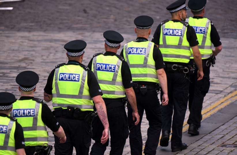 Police are seen at St Giles' Cathedral, Edinburgh, for the National Service of Thanksgiving and Dedication for King Charles III and Queen Camilla, and the presentation of the Honours of Scotland, in Edinburgh, Scotland, July 5, 2023.