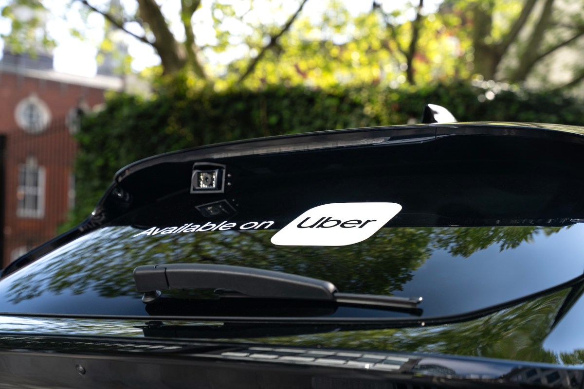Uber sticker on rear of car