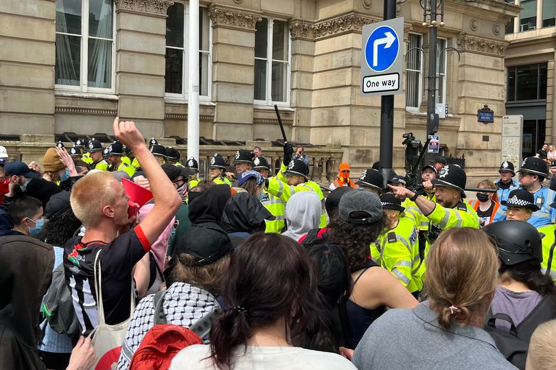 Four held as police fight to keep order amid tense Britain First rally and counter-protest
