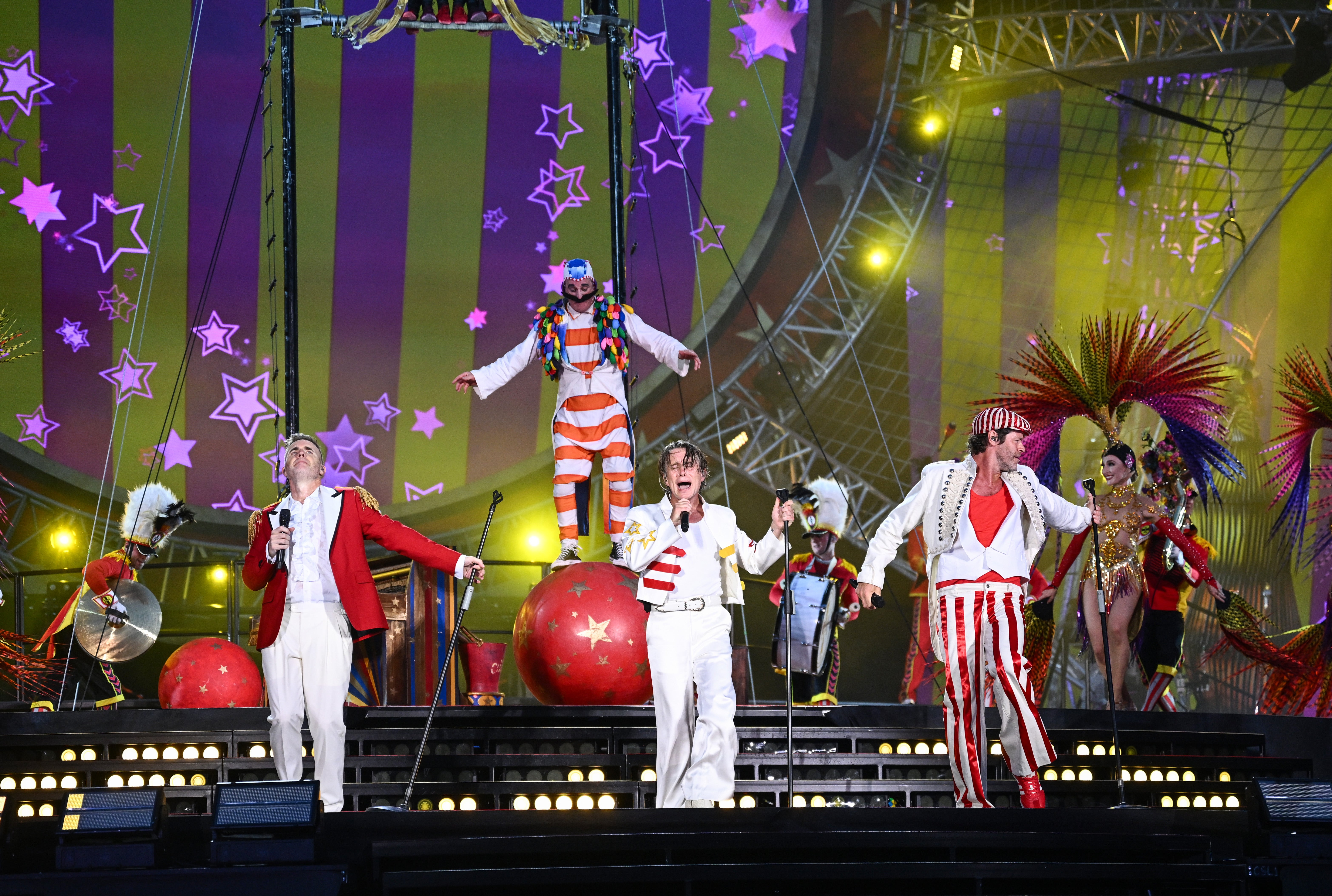 Take That are currentlty performing as a three-piece
