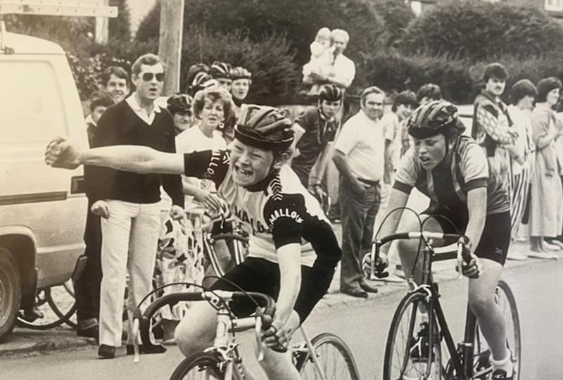 A victorious Dermot Sugrue racing in Clonakilty in 1986, watched by his father Ronan Sugrue in dark jumper and pale trousers. Photograph: Irish Examiner