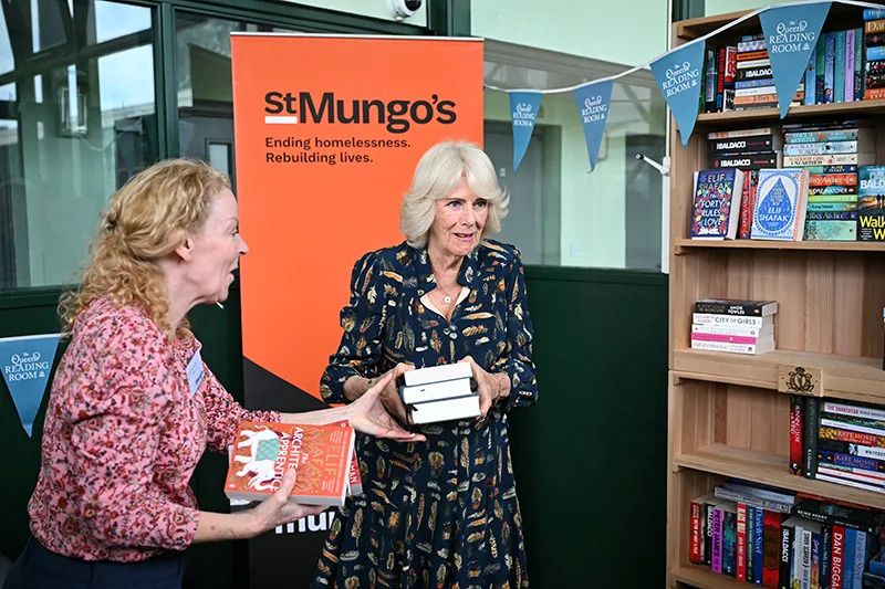 Queen Camilla wears Fiona Clare during a visit to one of St Mungo's homelessness accommodation sites on June 10 in London.