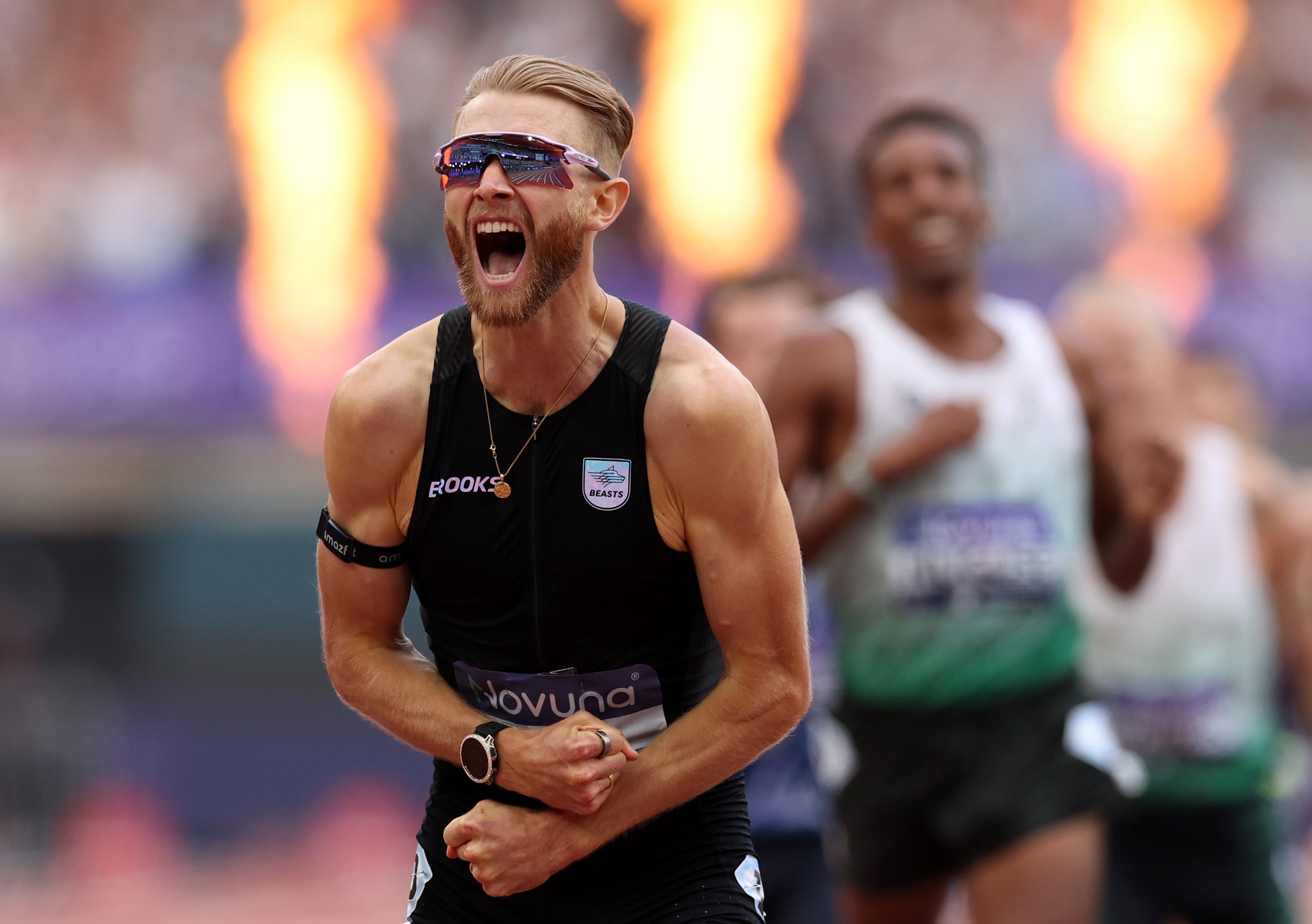 Josh Kerr of Team Great Britain celebrates after winning and setting a new world record