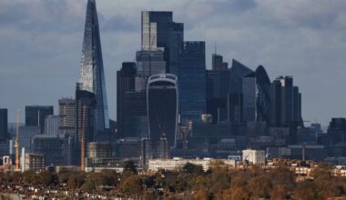 London skyline with The Shard, Walkie Talkie, and Gherkin skyscrapers towering over residential buildings and autumn trees.