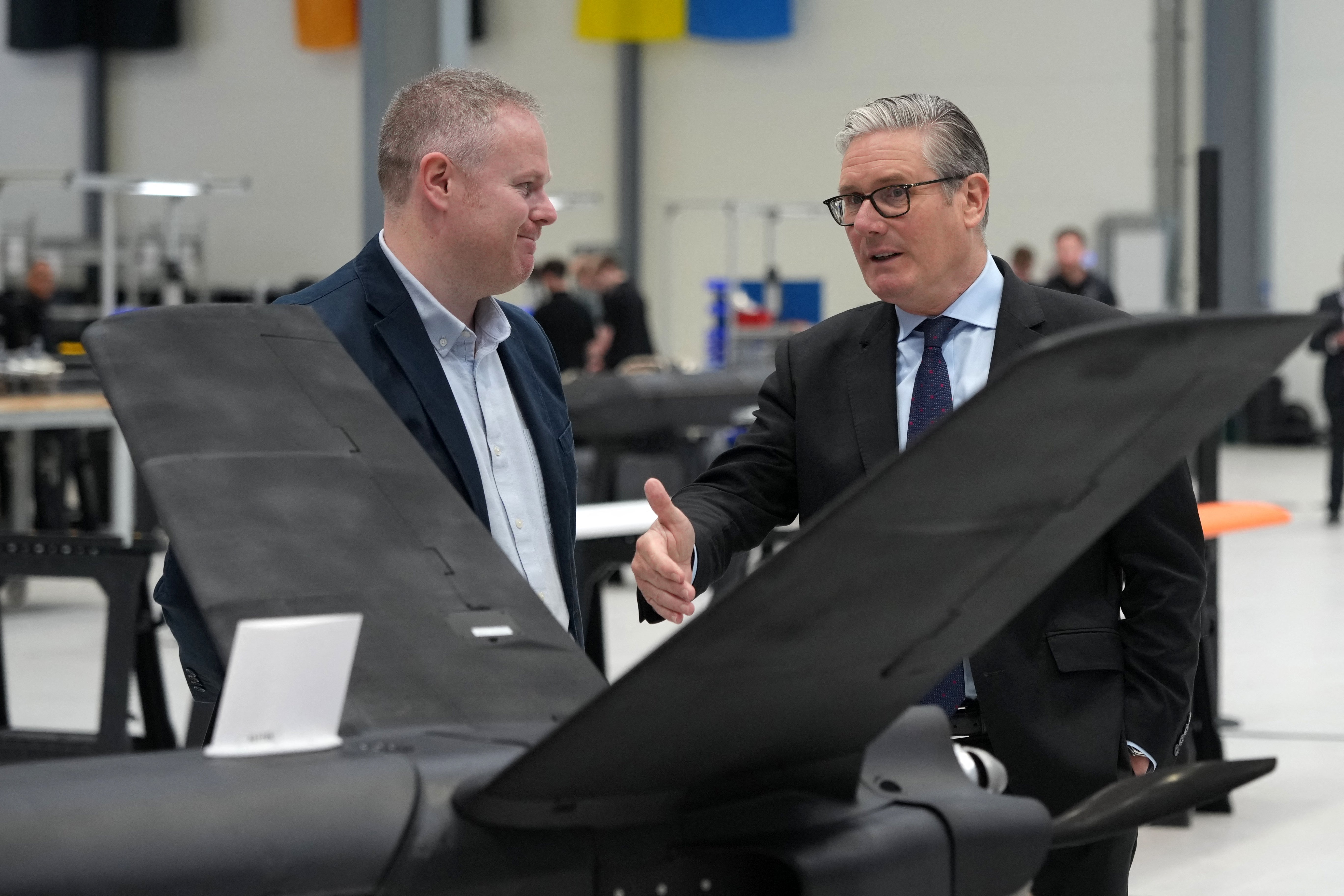 Former prime minister Keir Starmer looks at drones as he visits defence contractor Stark in Swindon in June