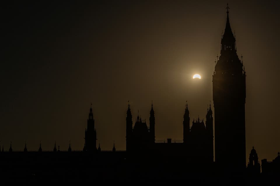 <p>A near total solar eclipse, with more than 90 percent of the Sun blocked by the Moon across Britain, is pictured behind Elizabeth Tower (R), more commonly known as Big Ben, in central London on August 12, 2026. Millions of people turned their gaze towards the heavens on August 12 to witness one of nature's greatest spectacles -- a rare total solar eclipse -- as it sweeps over mainland Europe to briefly turn day into night. (Photo by Toby Shepheard / AFP via Getty Images)</p>