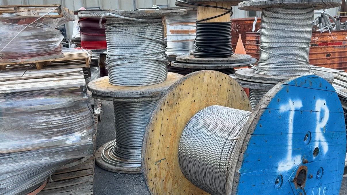 Wooden spools and wires that have been returned to National Grid's Investment Recovery Center. (Spectrum News/Natalie Mooney)