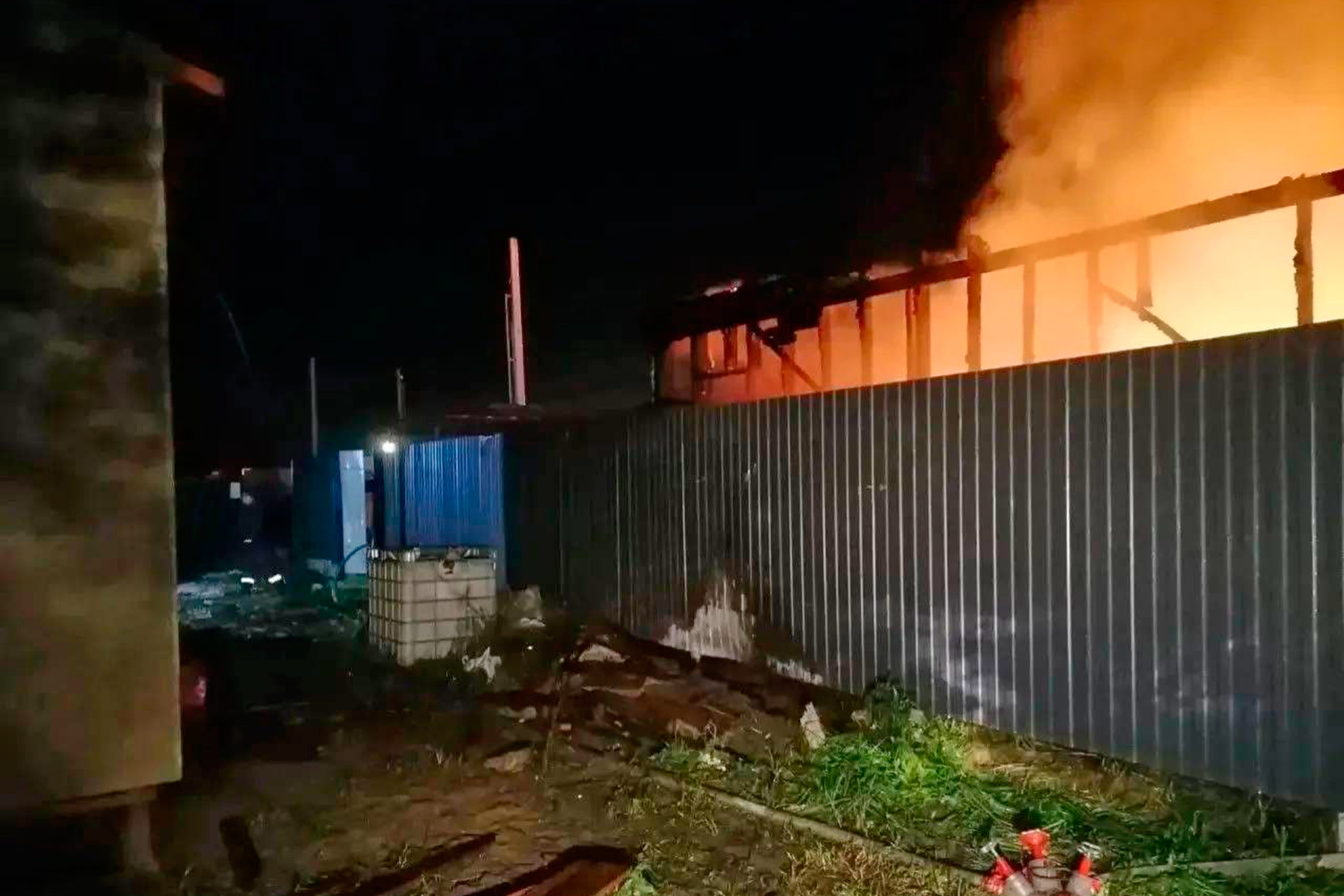 A warehouse on fire in Moscow after a Ukrainian drone strike on Tuesday morning