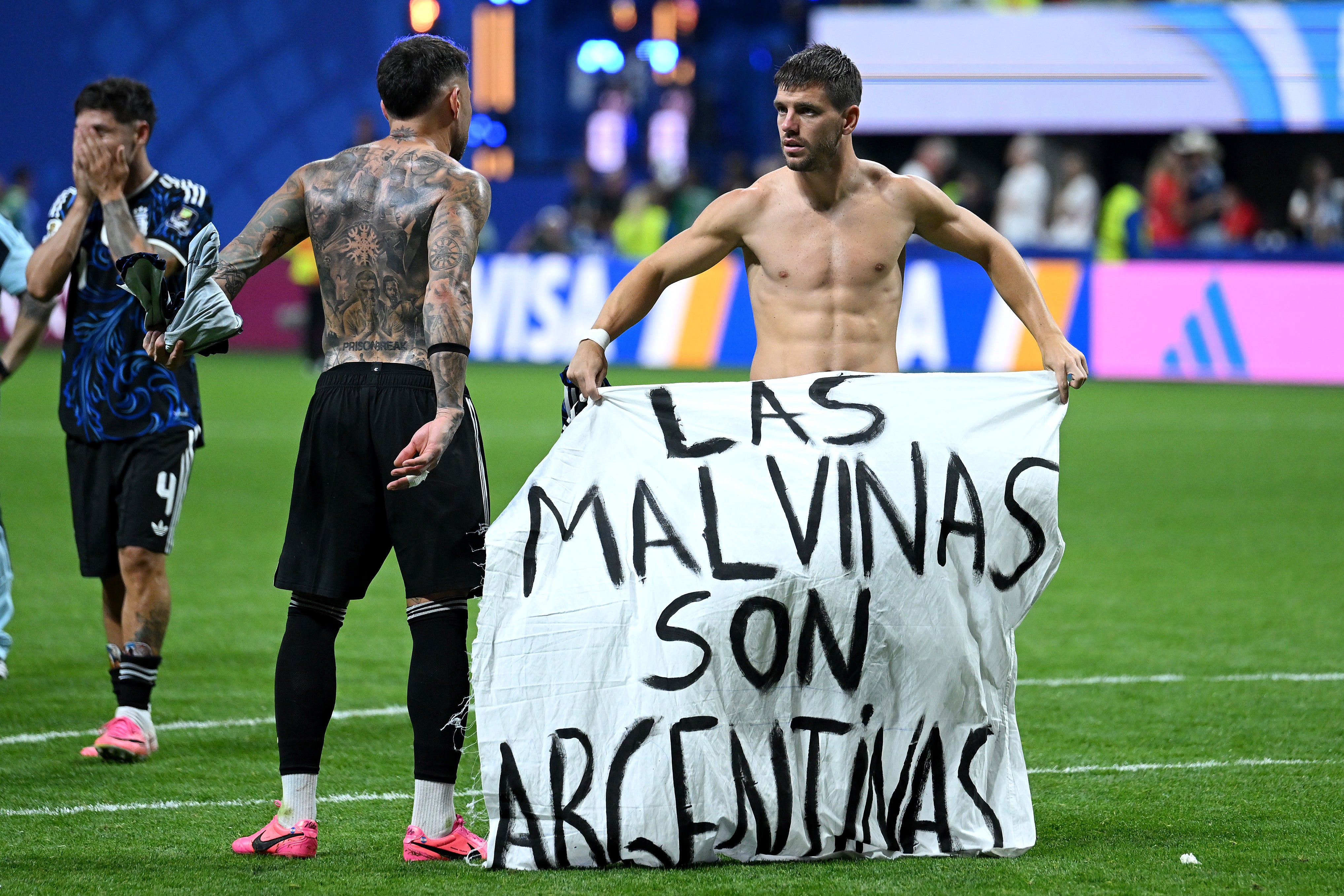 Players held a banner after the semi-final match that translates as ‘The Falklands are Argentine’
