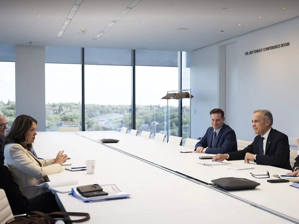  Alberta Premier Danielle Smith (L) and Prime Minister Mark Carney (R) and others during a meeting June 1, 2025.