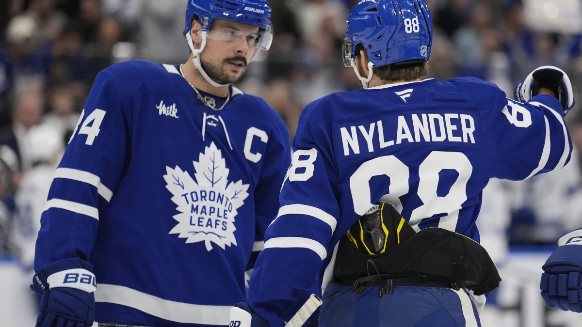 Toronto Maple Leafs forward William Nylander (88) and forward Auston Matthews (34) discuss a play against the Tampa Bay Lightning during the first period at Scotiabank Arena.