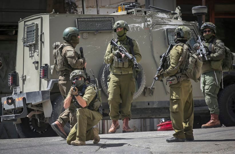 (ILLUSTRATIVE) Israeli security forces operate during a raid in the West Bank city of Nablus, April 27, 2026