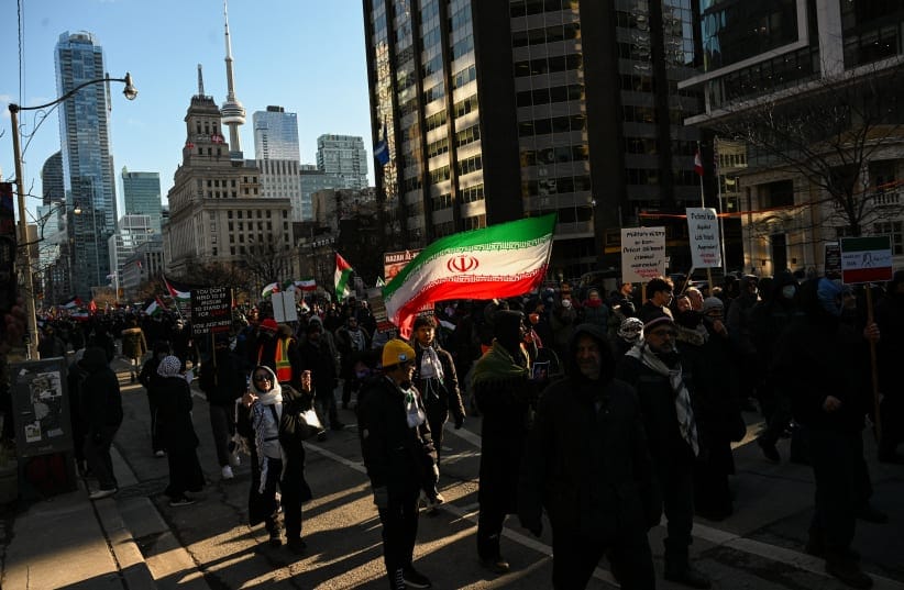 PROTESTERS MARCH at a rally marking Al-Quds Day and opposing the war on Iran and Lebanon in downtown Toronto, Ontario, Canada, March 14, 2026. 