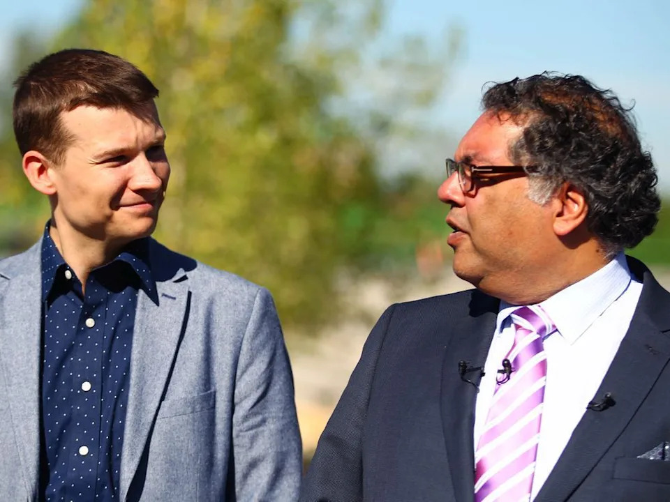 Former mayor Naheed Nenshi and with then-city councillor Jeremy Farkas at a press conference on June 20, 2018.