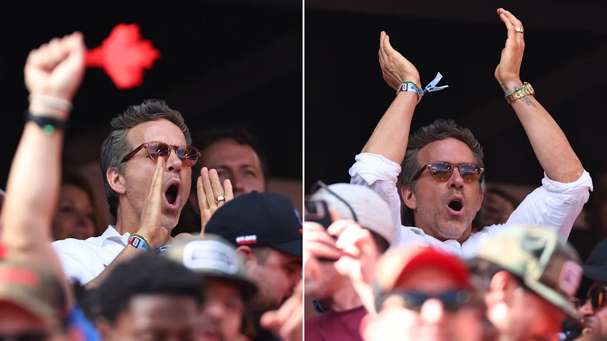 Ryan Reynolds and Mike Myers wildly celebrate in Toronto after Canada scores first goal in World Cup opener
