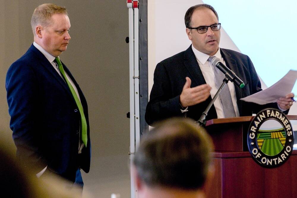 Crosby Devitt, Grain Farmers of Ontario's CEO, right, speaks at a past annual meeting. Photo: File