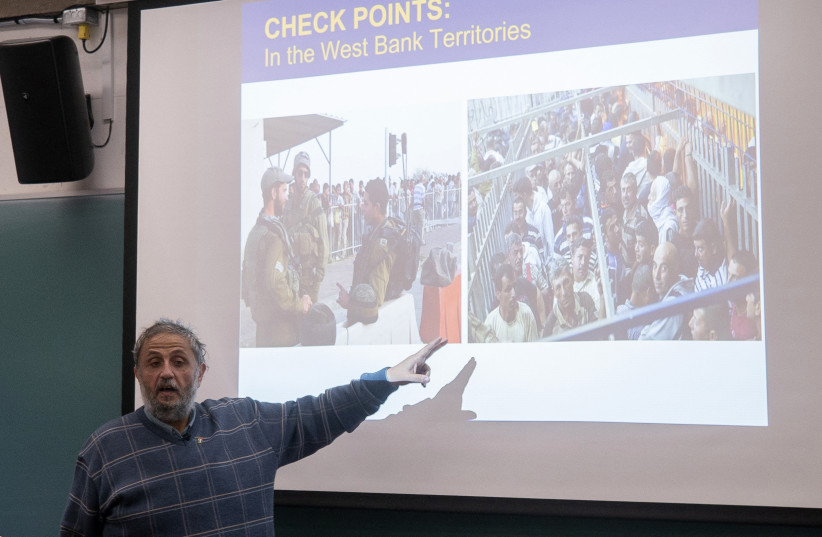 Palestinian professor Ahmed Abu Shaban, visiting professor in the Faculty of Environmental and Urban Change, gives a lecture on Gaza at York University in Toronto, Canada, on November 26, 2024.