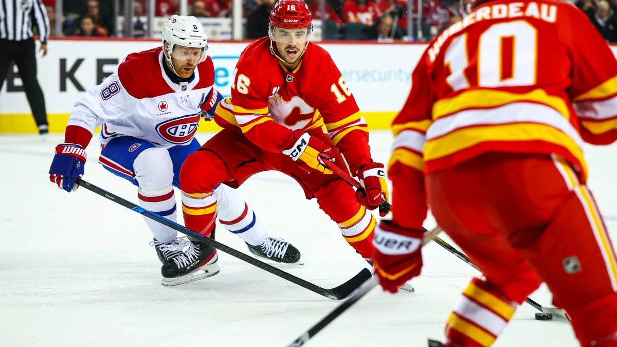 Calgary Flames center Morgan Frost (16) controls the puck Montreal Canadiens during the second period at Scotiabank Saddledome.