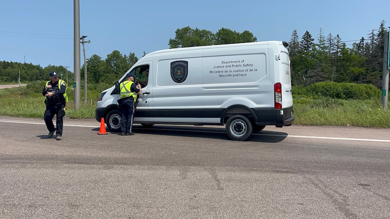 A coroner's van is pictured near the scene of a fatal two-vehicle collision in Melrose, N.B., on July 7, 2026. (Derek Haggett/CTV News Atlantic)