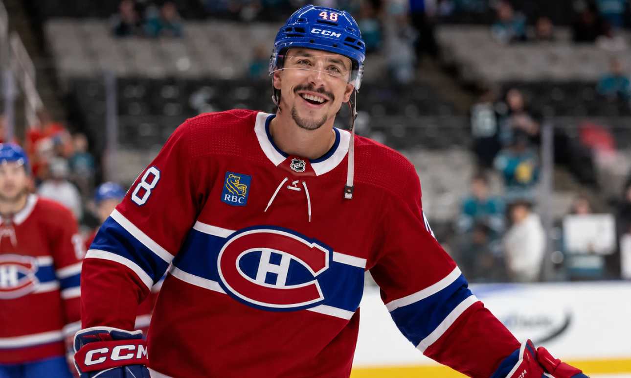Morgan Frost in a Montreal Canadiens jersey amid NHL trade rumors linking the Calgary Flames forward to Montreal