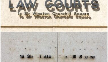 Vandals snatch signage off side of Edmonton Law Courts building