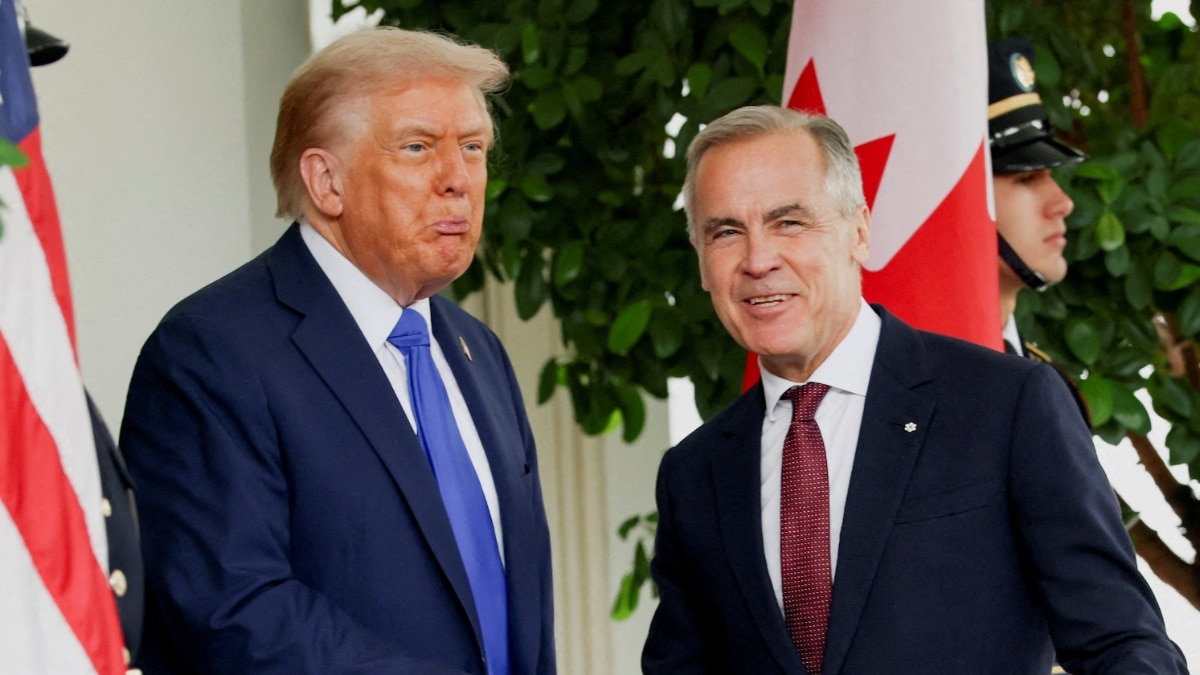 US President Donald Trump welcomes Canada's Prime Minister Mark Carney at the White House in Washington, DC, October 7, 2025.