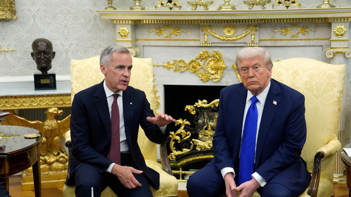 Trump vows to double tariffs on Canadian autos as tensions mount