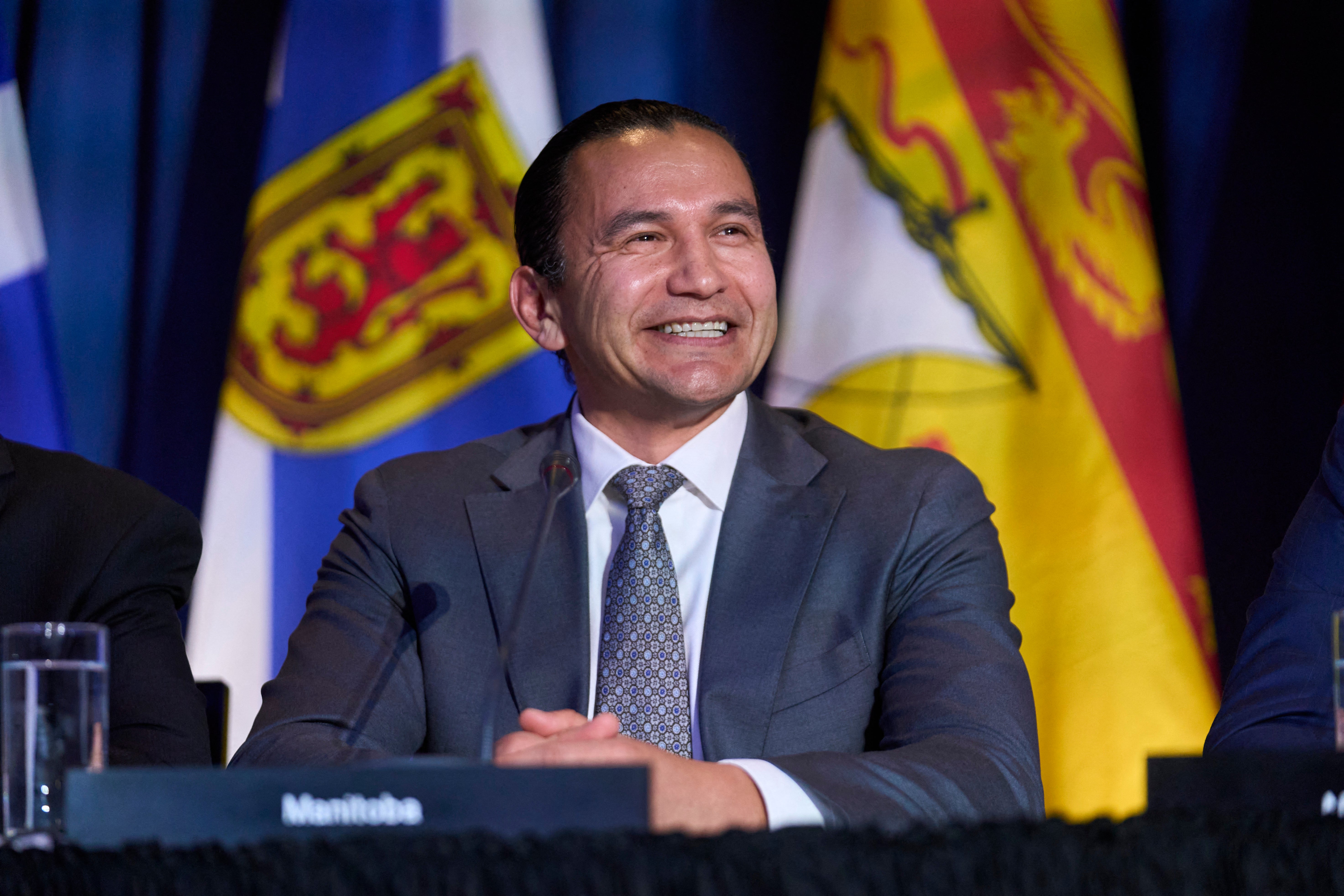 Premier of Manitoba Wab Kinew listens to questions during a press conference at Canada's Premier's Conference in Toronto in 2024