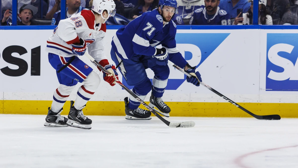 Montreal Canadiens defenseman Lane Hutson (48) defends Tampa Bay Lightning forward Anthony Cirelli (71) during the first period in game seven of the first round of the 2026 Stanley Cup Playoffs at Benchmark International Arena.
