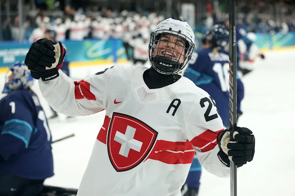 MILAN, ITALY - FEBRUARY 14: Alina Muller #25 of Team Switzerland celebrates after scoring a goal in the second period during the Women's Quarterfinals match between Finland and Switzerland on day eight of the Milano Cortina 2026 Winter Olympic games at Milano Rho Ice Hockey Arena on February 14, 2026 in Milan, Italy. (Photo by Joosep Martinson/Getty Images)