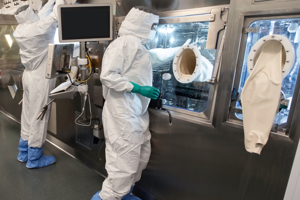 Specialists on the production line in Novartis' in Indianapolis, which is one of three plants currently in operation in the United States. (Courtesy of Novartis)